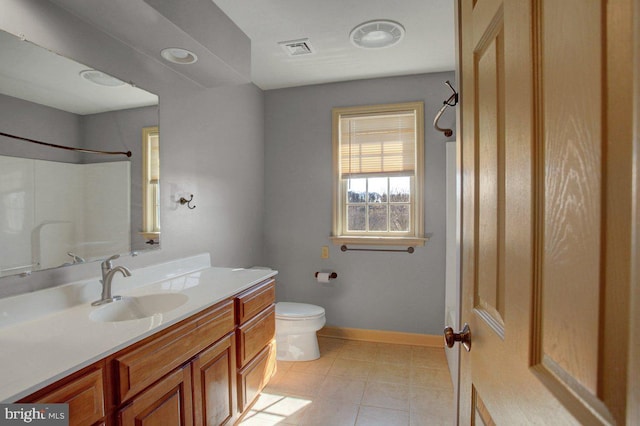 bathroom featuring visible vents, walk in shower, baseboards, toilet, and vanity