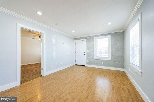 empty room with recessed lighting, baseboards, light wood-style floors, and ornamental molding