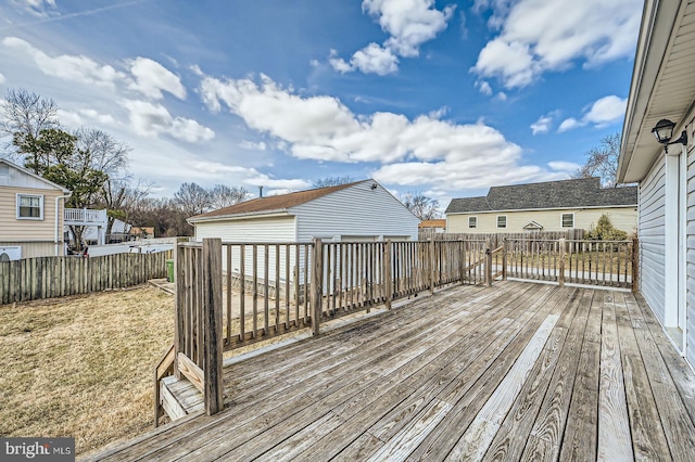 wooden terrace featuring fence