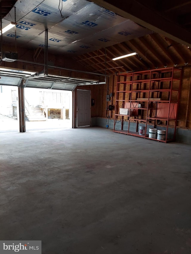 510 Middle River Rd, Baltimore, MD 21220 - garage featuring a garage door opener