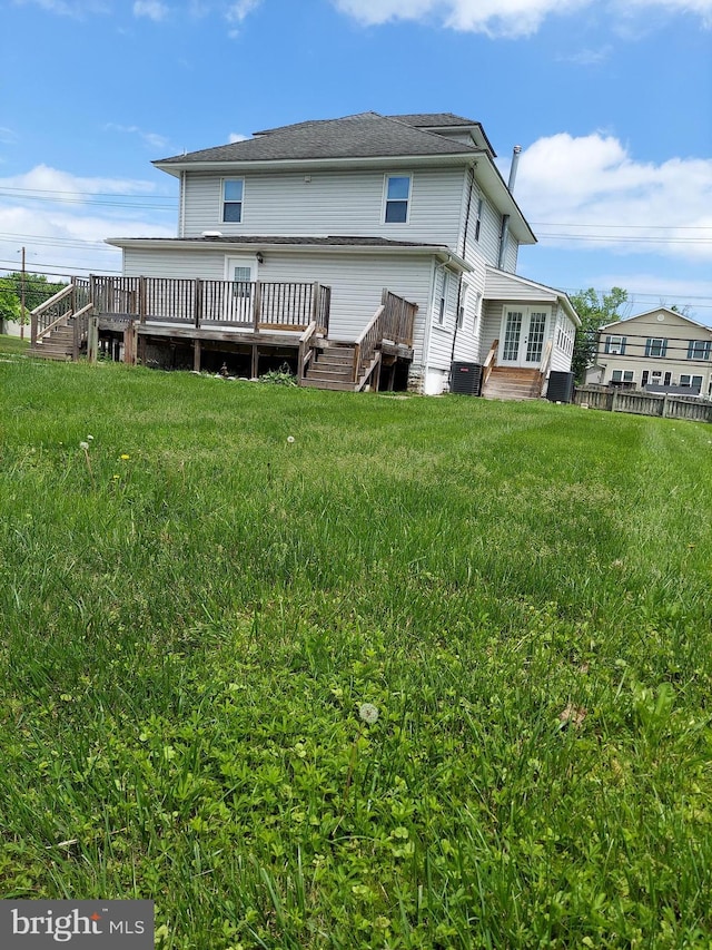 510 Middle River Rd, Baltimore, MD 21220 - back of property with a deck, a yard, and central AC unit