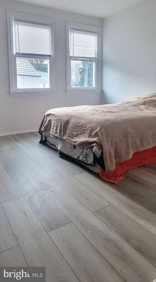 bedroom featuring hardwood / wood-style floors