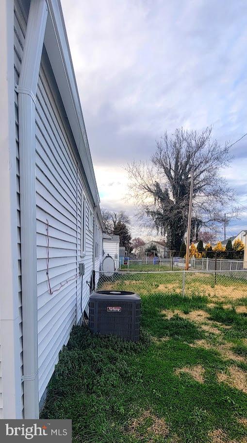 view of yard featuring central AC