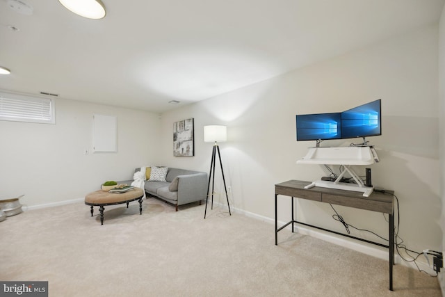 living area with carpet flooring and baseboards