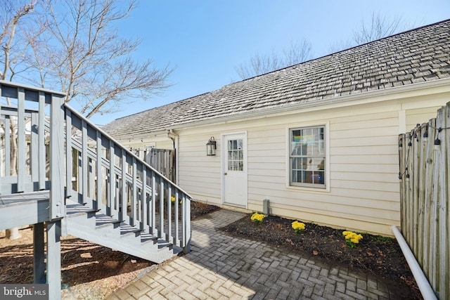 property entrance featuring a patio area