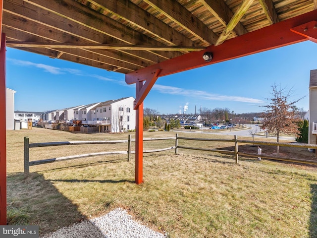 view of yard featuring a residential view