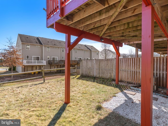 view of yard featuring a residential view and fence