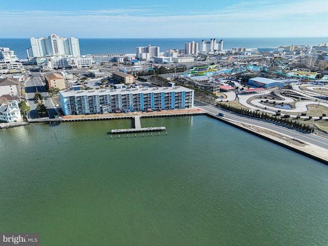 drone / aerial view with a view of city and a water view