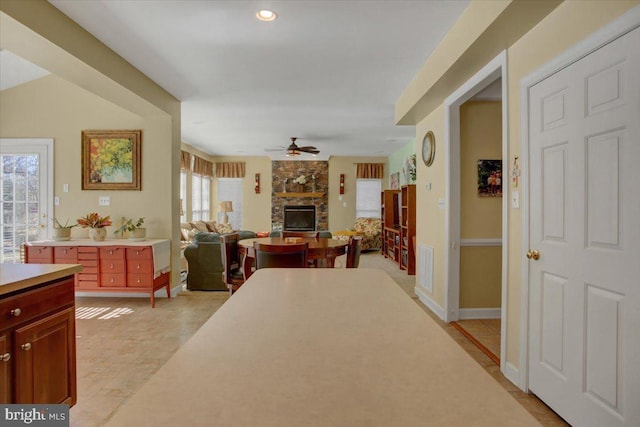 corridor featuring visible vents, recessed lighting, and baseboards