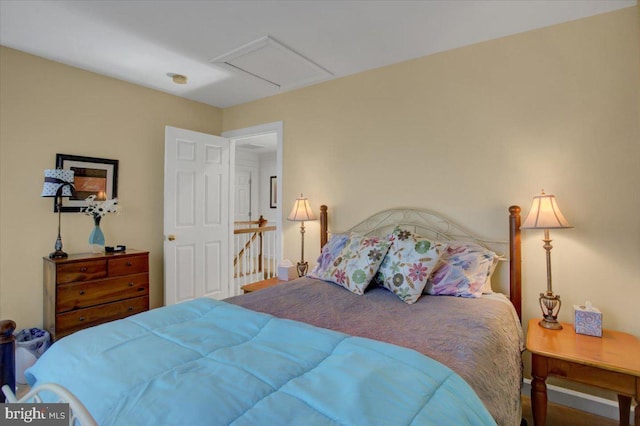 bedroom featuring attic access