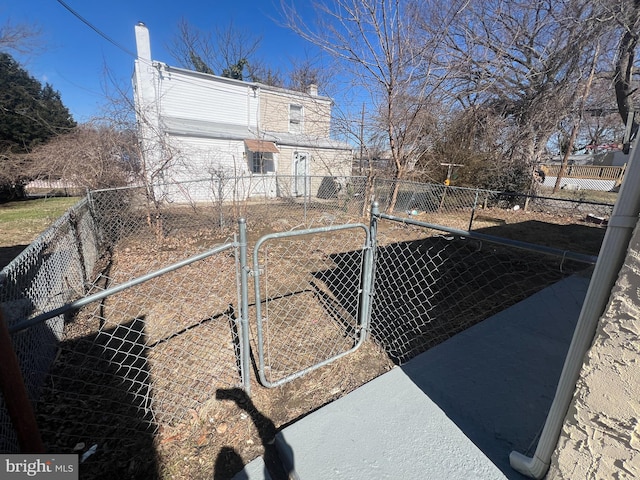 view of yard with a gate and fence