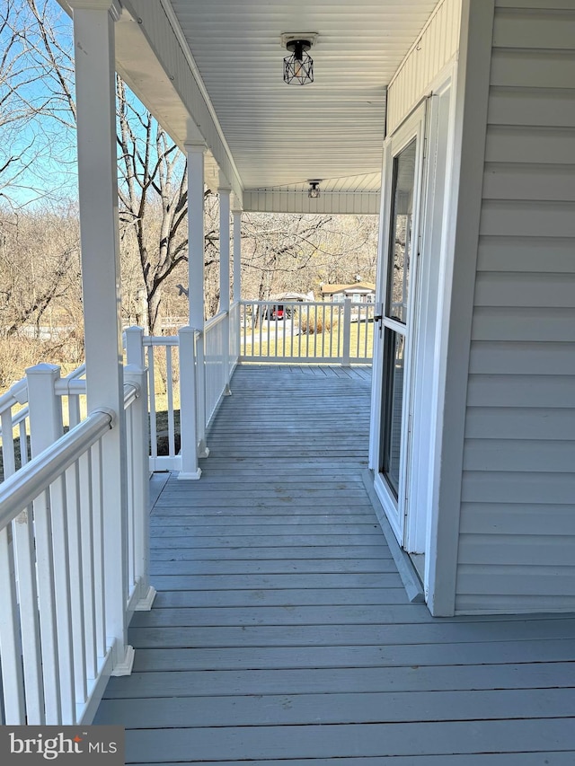 wooden terrace with covered porch