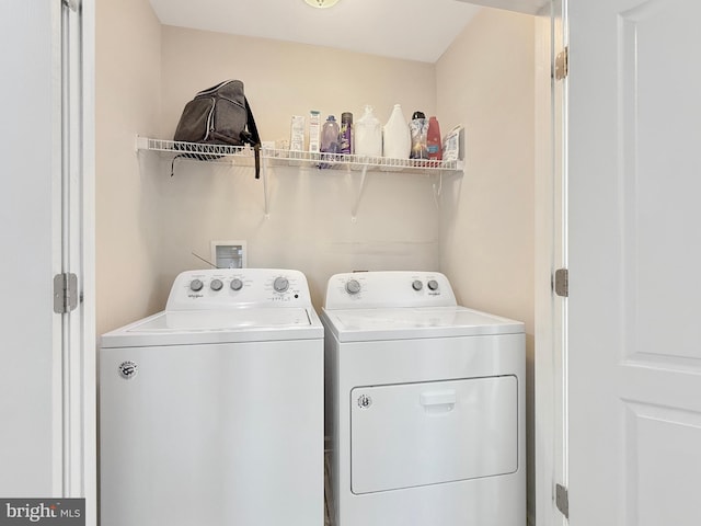 laundry room with washing machine and dryer and laundry area