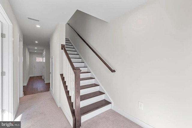 stairs featuring recessed lighting, visible vents, carpet flooring, and baseboards