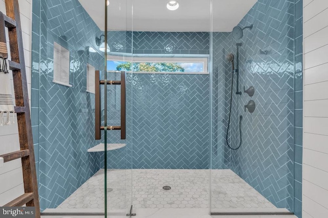 bathroom featuring a stall shower