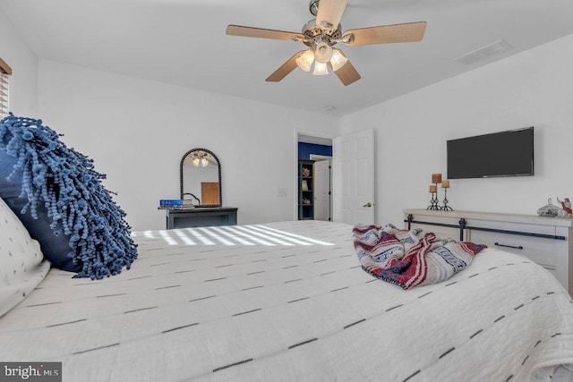 bedroom featuring visible vents and a ceiling fan