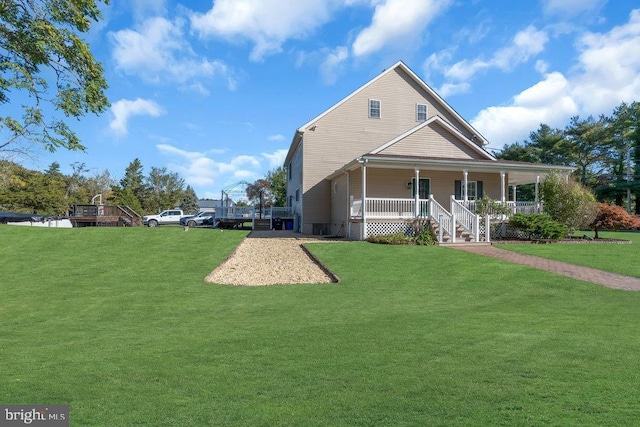 view of front facade with covered porch and a front lawn