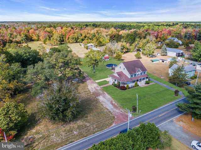 aerial view featuring a forest view