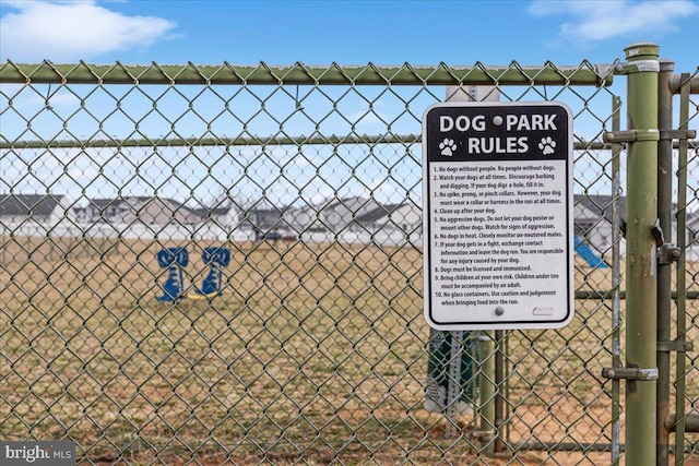 exterior space with fence and a gate