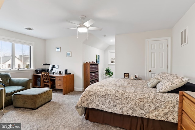 bedroom featuring light colored carpet, visible vents, ceiling fan, and baseboards