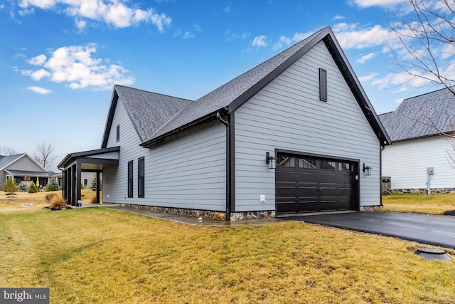 view of property exterior with aphalt driveway, a lawn, a shingled roof, and a garage