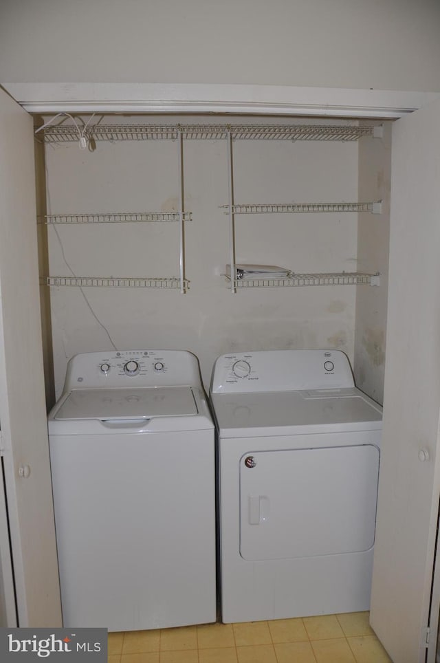 laundry area featuring washer and dryer and laundry area