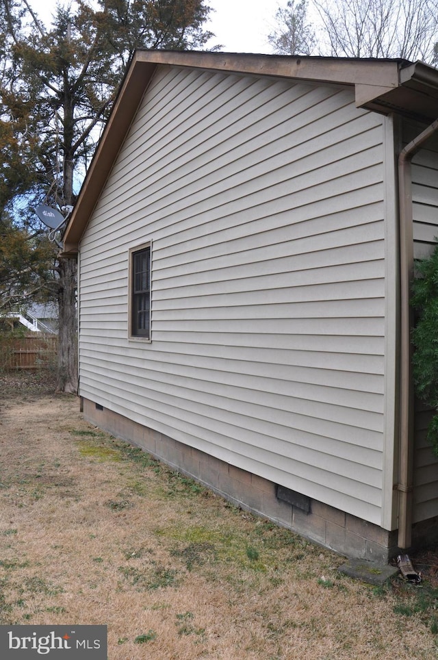 view of home's exterior featuring crawl space