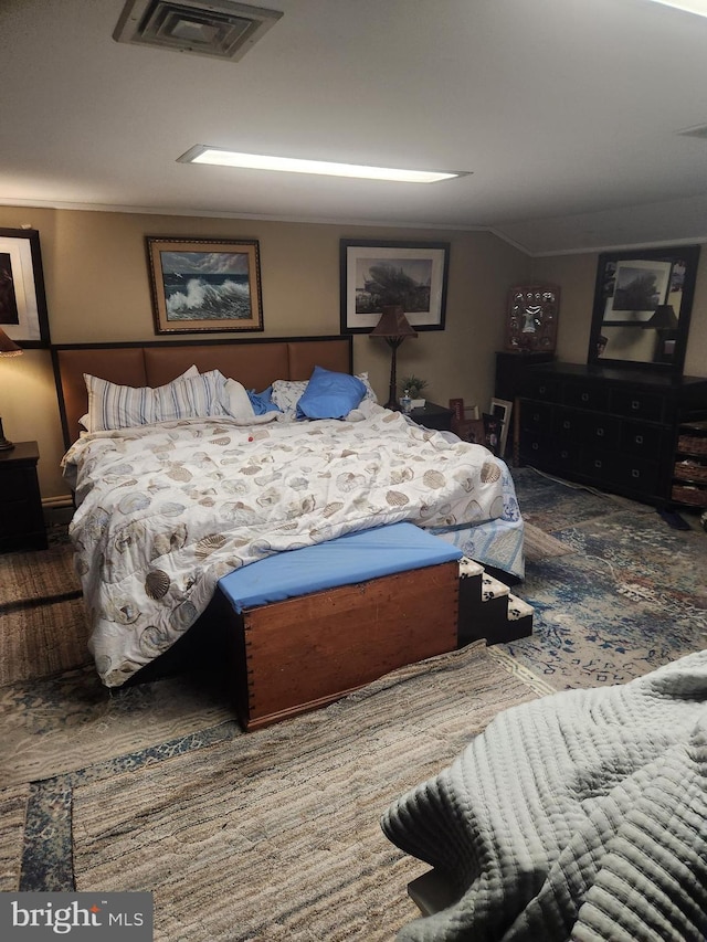 bedroom with visible vents