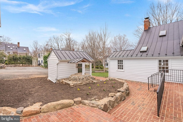 15570 Second St, Waterford, VA 20197 - view of patio with an outbuilding