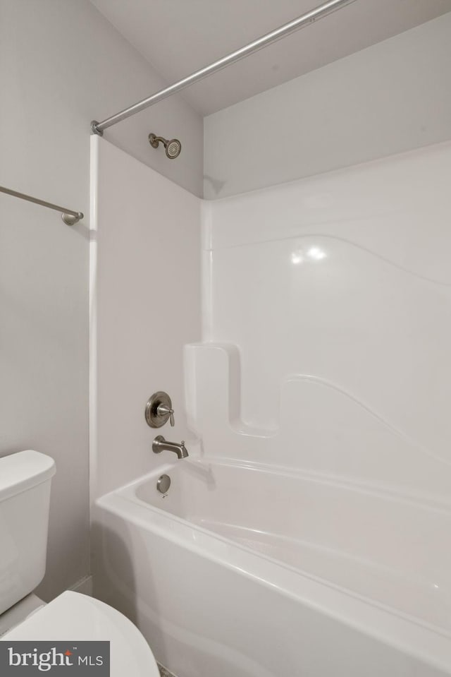 full bath featuring shower / bath combination and toilet