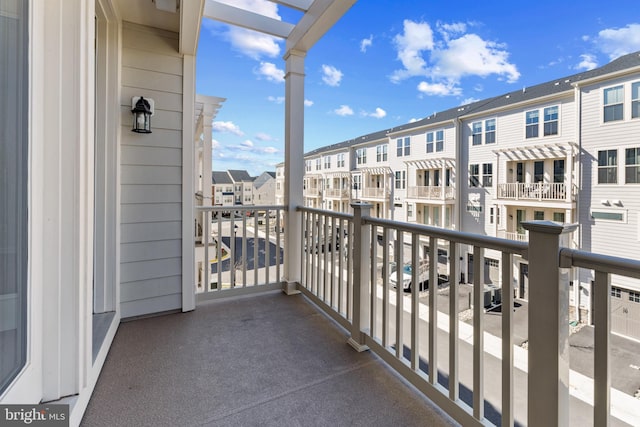 balcony featuring a residential view