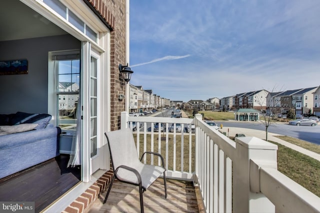 balcony featuring a residential view