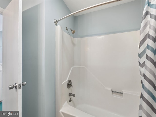 full bathroom with shower / tub combo with curtain