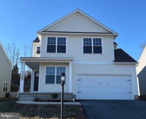 view of front of house with driveway and an attached garage