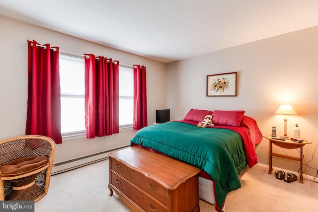 bedroom with carpet flooring, baseboards, and a baseboard radiator