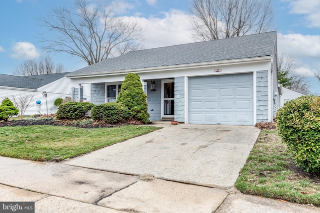 single story home with driveway, a front lawn, a garage, and roof with shingles