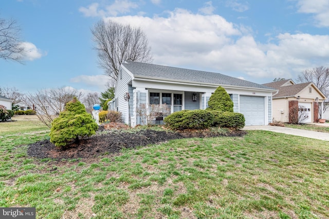 single story home featuring a front yard, a garage, and driveway