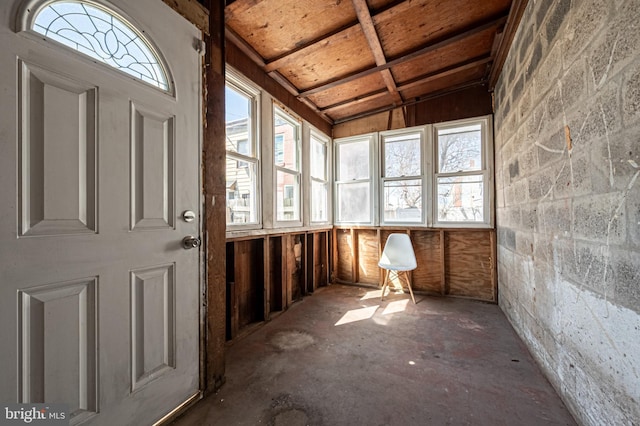 unfurnished sunroom with plenty of natural light