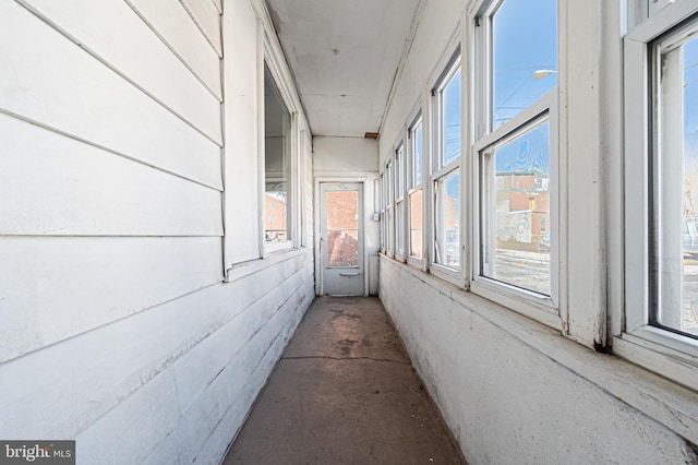 corridor featuring a sunroom