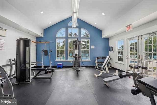 gym featuring recessed lighting, a healthy amount of sunlight, and baseboards