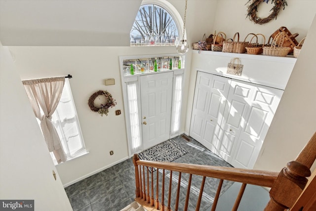 foyer entrance with baseboards