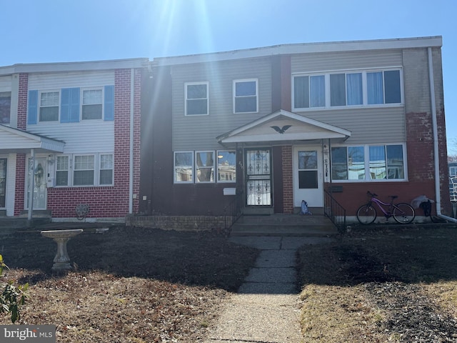 view of front facade with brick siding