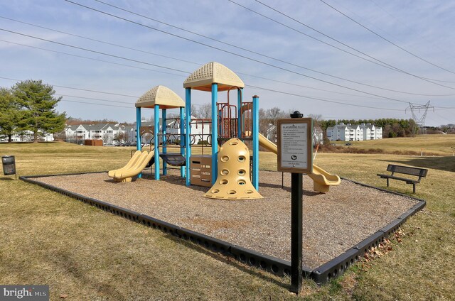 communal playground with a lawn