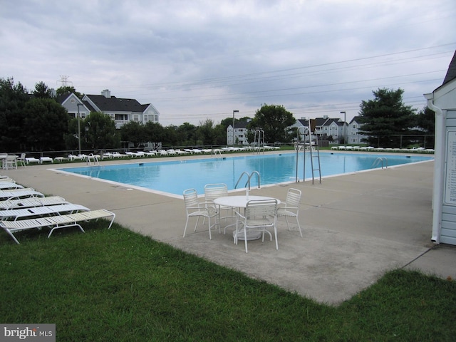 pool featuring a patio area