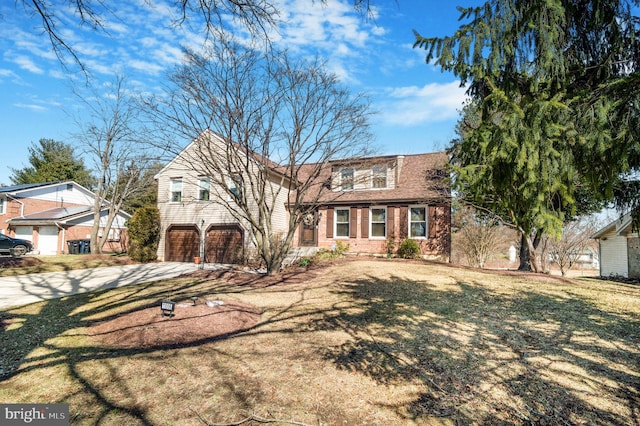 view of front of property featuring a front lawn, brick siding, a garage, and roof with shingles