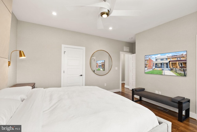 bedroom with dark wood finished floors, recessed lighting, visible vents, and ceiling fan