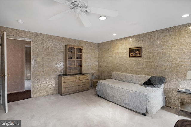 living area featuring recessed lighting, carpet floors, and a ceiling fan