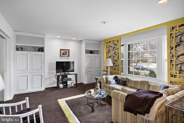 living room with recessed lighting, baseboards, and carpet floors