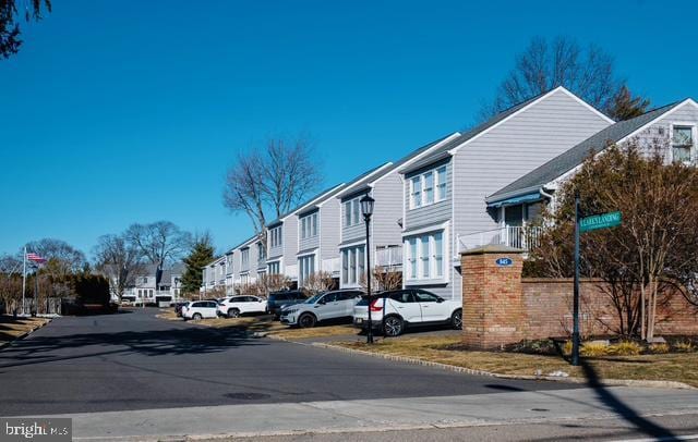 view of road featuring a residential view