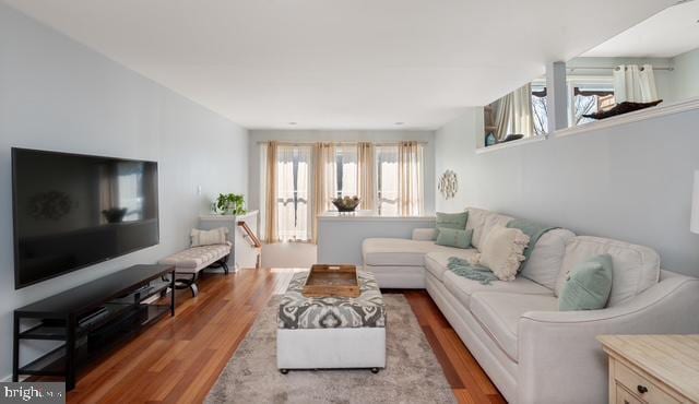 living room with wood finished floors